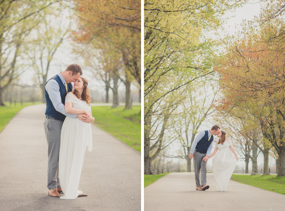 Photography of bride and groom kissing and snuggling on tree lined street at wedding at Knox Farm near Buffalo, NY