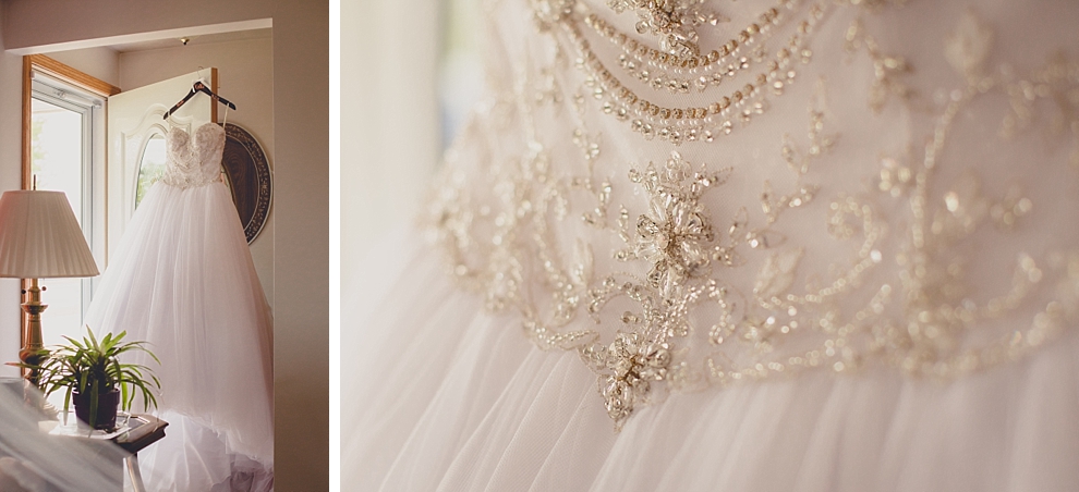 photography of brides dress hanging before garden wedding ceremony at Samuel