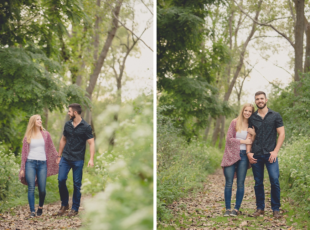 engagement photography of couple walking in in forest at Tifft Nature Preserve in Buffalo, NY