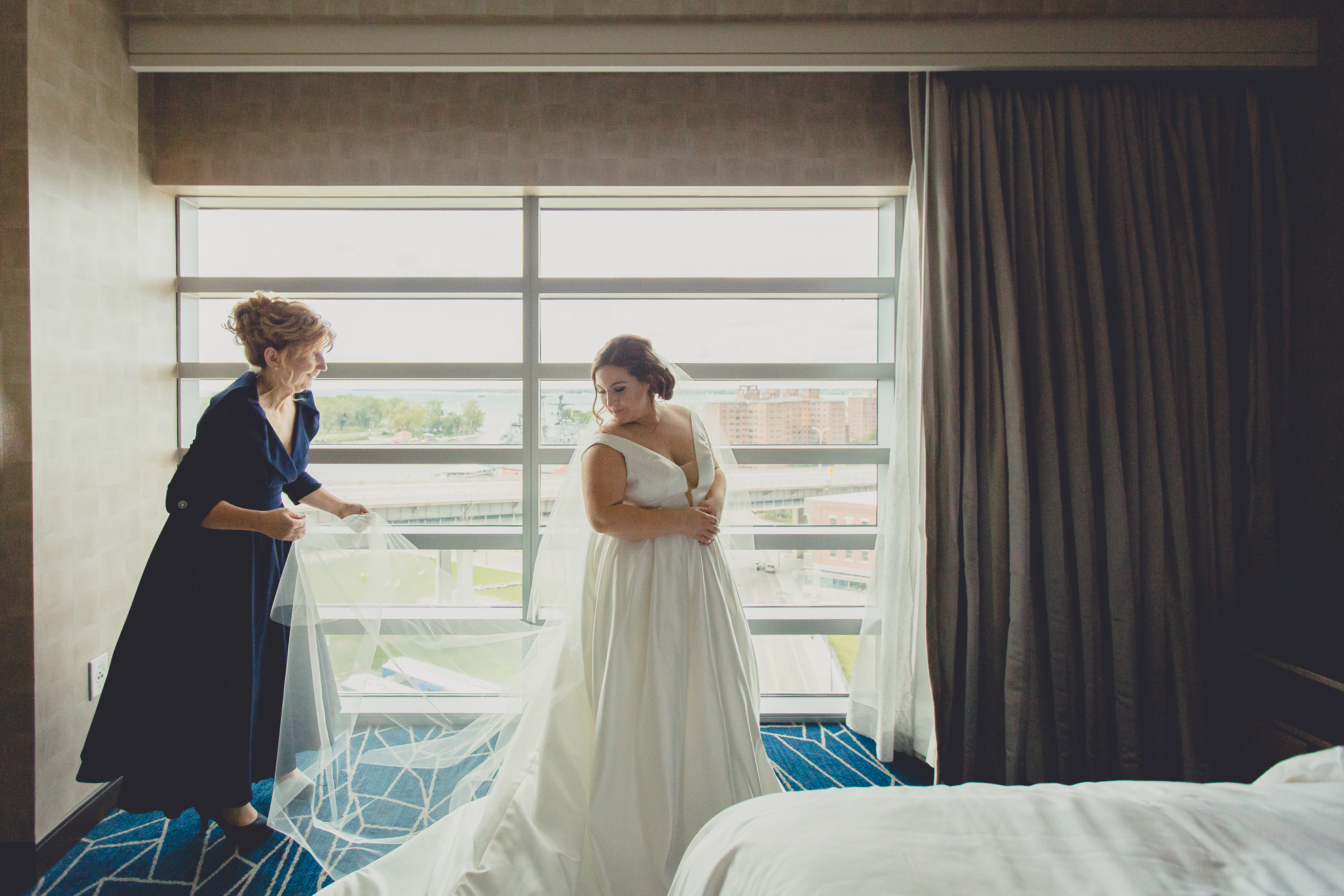 mom helps bride get ready for wedding in Buffalo, NY