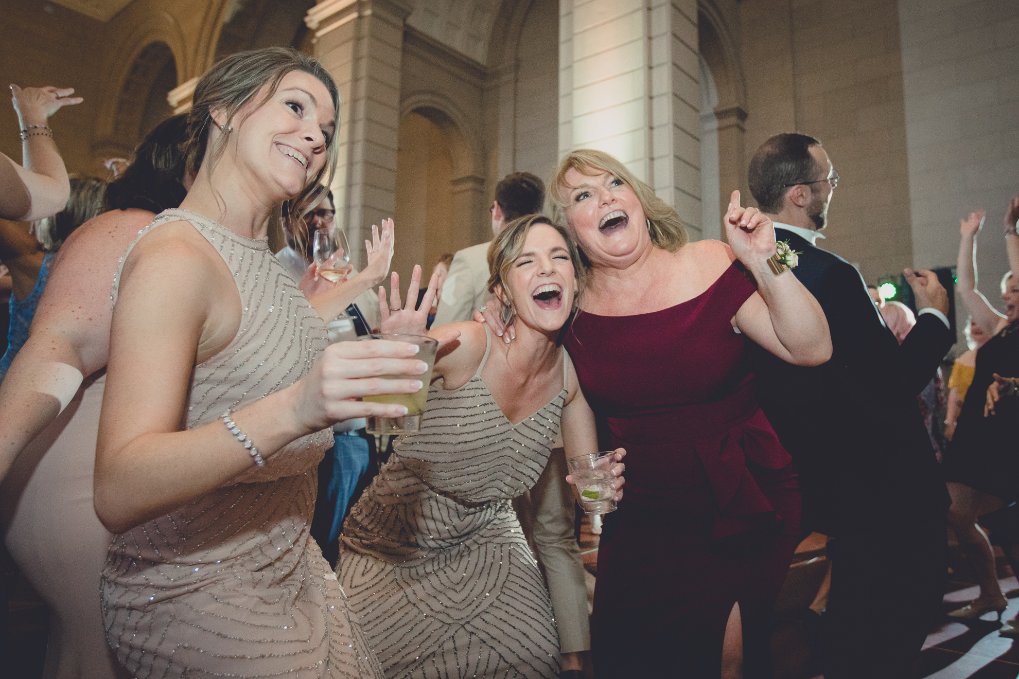 bridesmaids and mom dance at wedding reception at the Admiral Room in Buffalo, NY