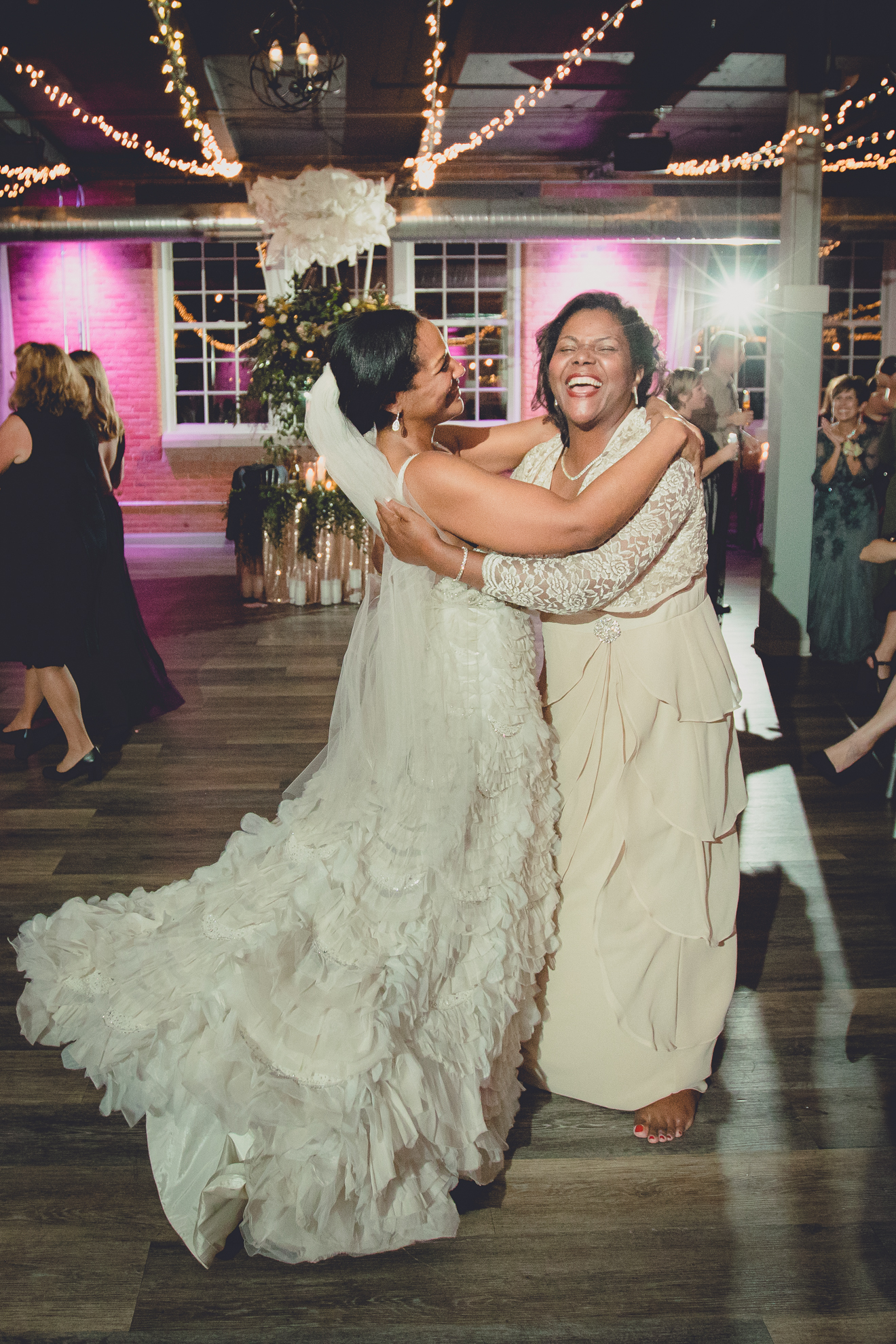 bride and mom dance at wedding reception at the Foundry in Buffalo, NY
