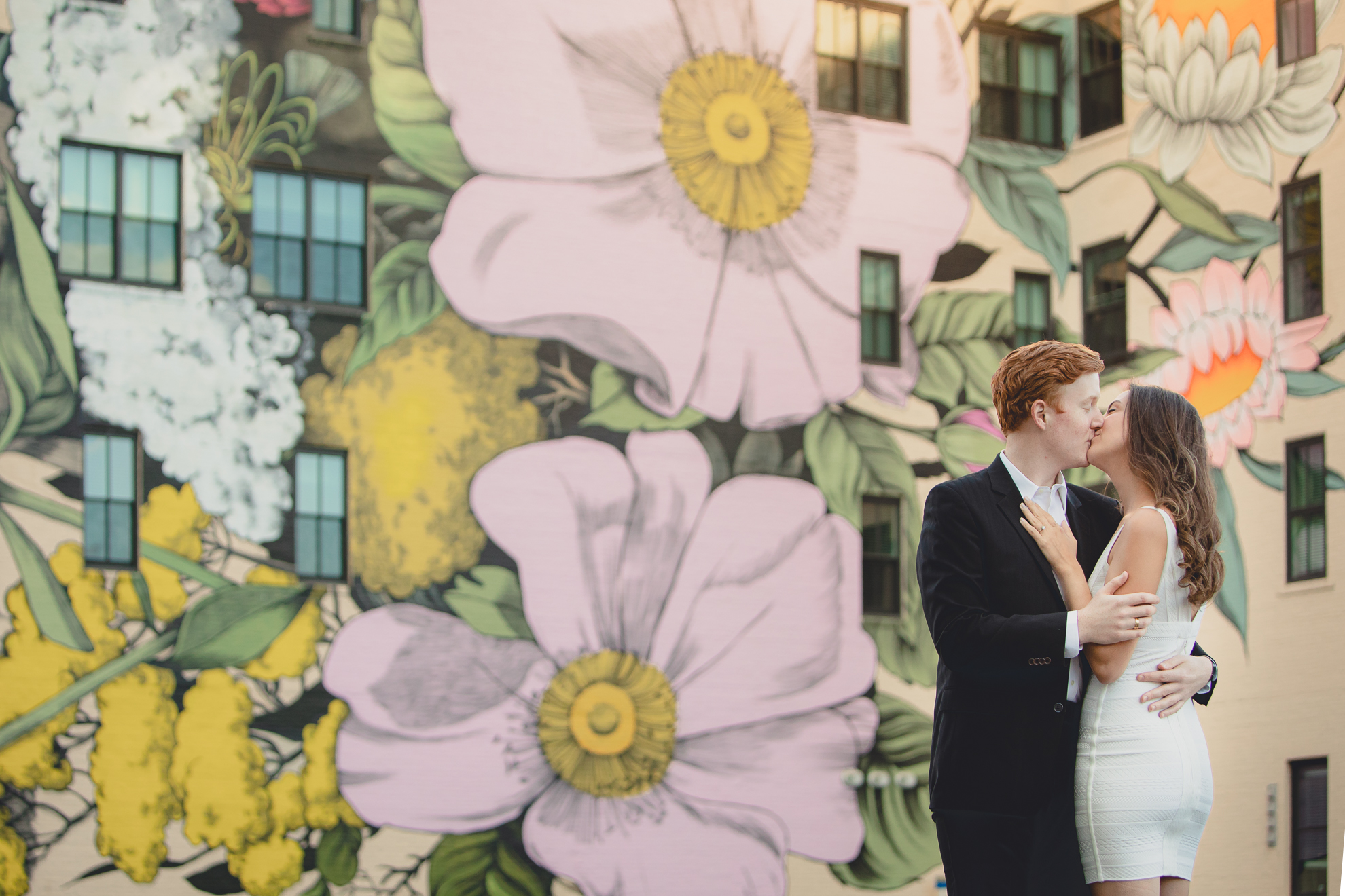 Courtney Woods and John Stevens wedding engagement portrait photography at Wildflowers for Buffalo mural in Buffalo, NY