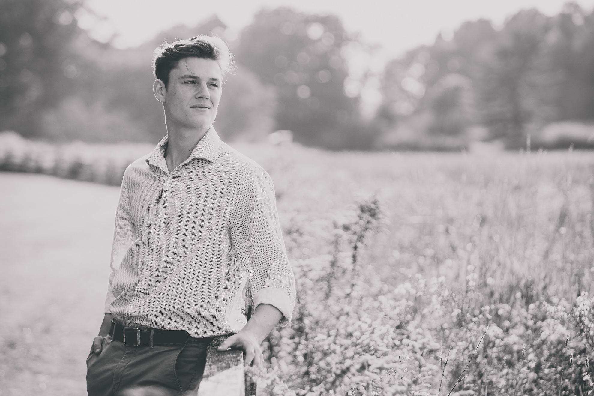 wny senior from east aurora highschool poses for photographer during senior portrait photography session at Knox Farm near Buffalo, NY