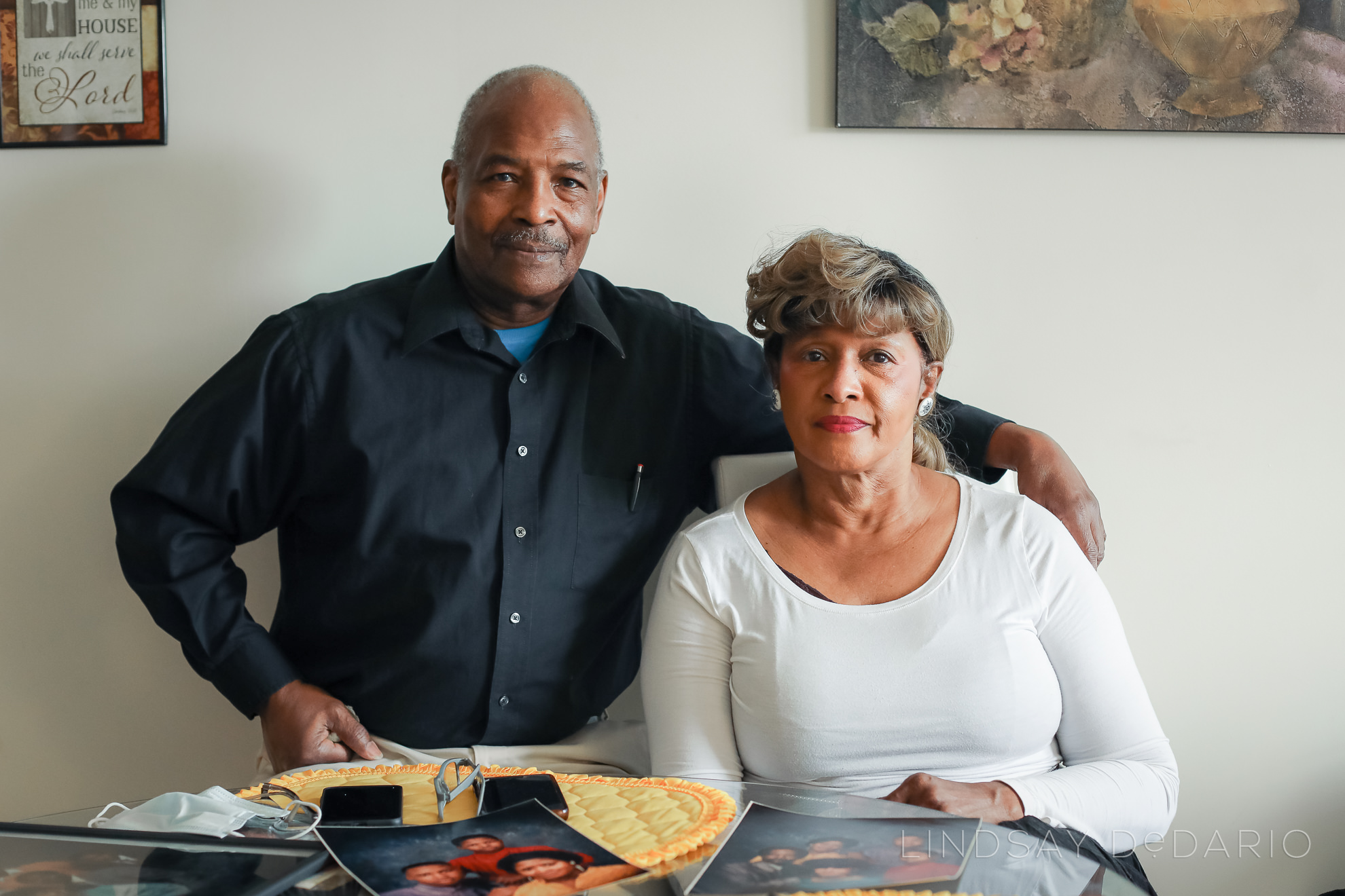Frank and Sharlene Simmons, parents of Silvon Simmons, pose for portrait in their home in Rochester, NY