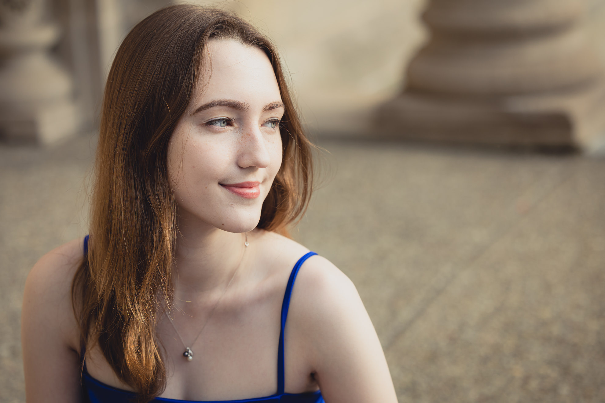 Canisius College senior poses for photographer during graduation portrait photography session on the Canisius campus in Buffalo, NY