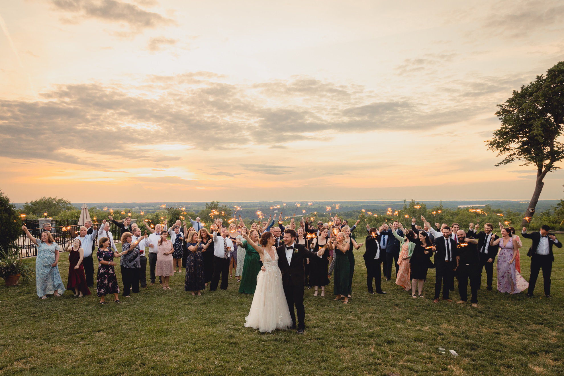 guests use sparklers during wedding reception at the Niagara Falls Country Club