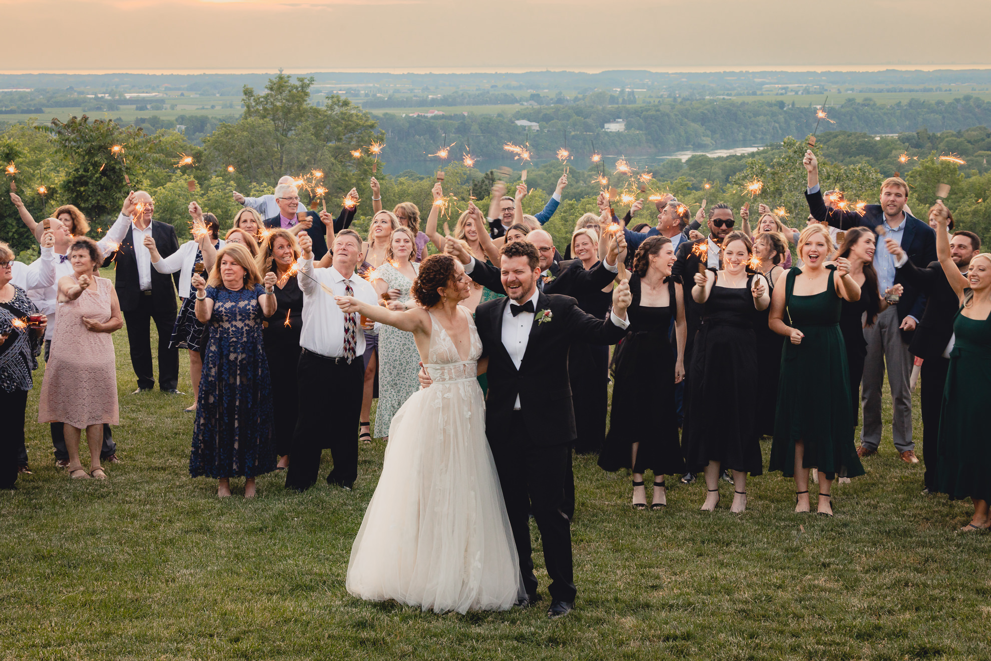 guests use sparklers during wedding reception at the Niagara Falls Country Club