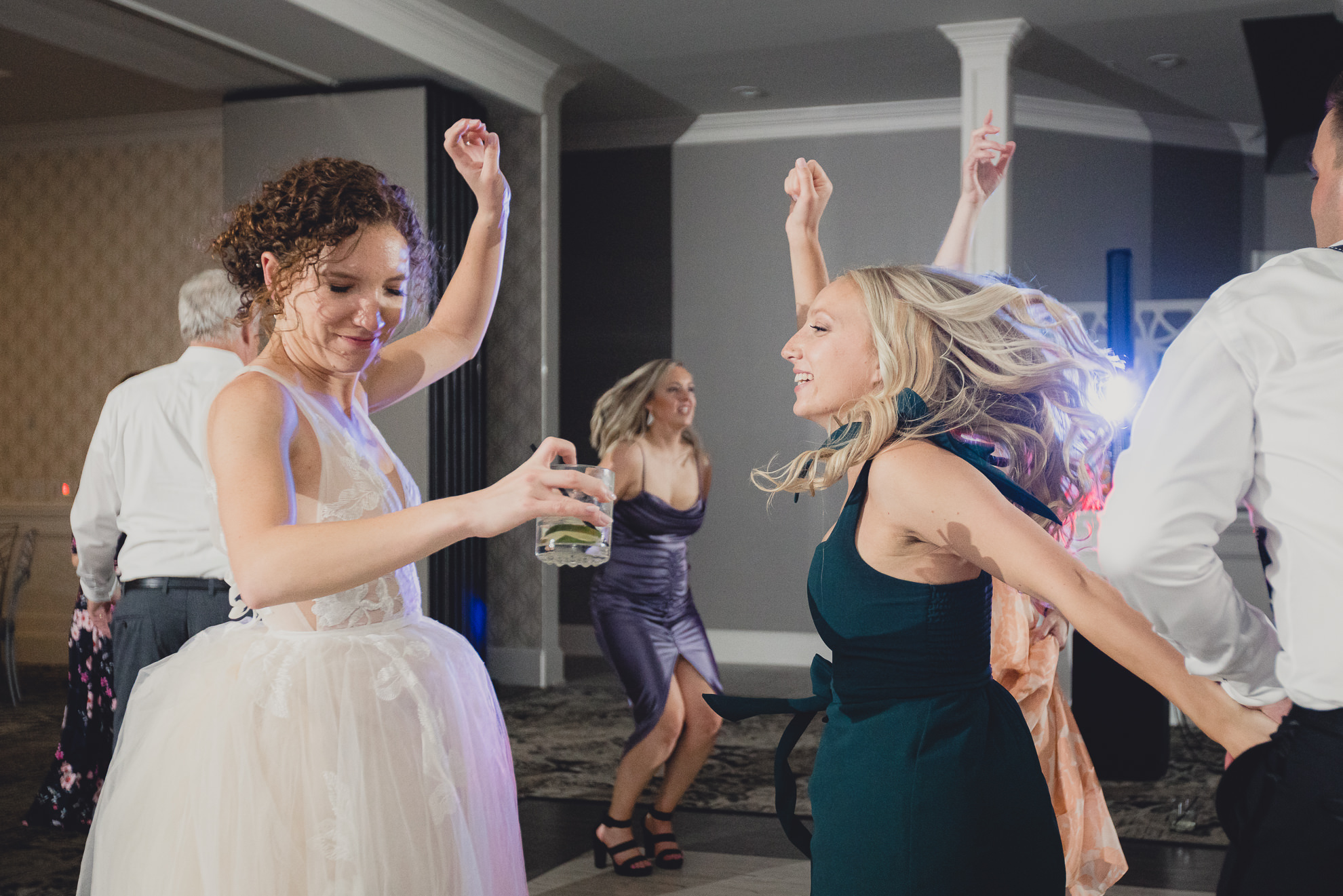 guests dance during wedding reception at the Niagara Falls Country Club