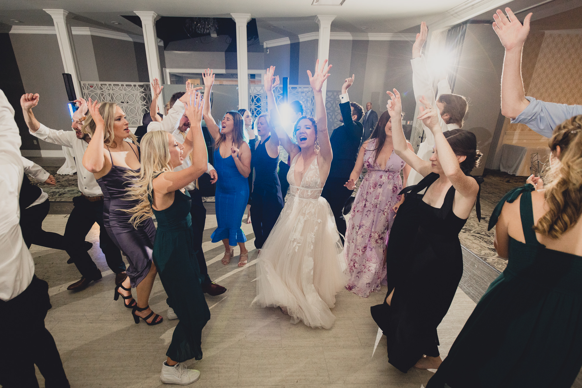 guests dance during wedding reception at the Niagara Falls Country Club