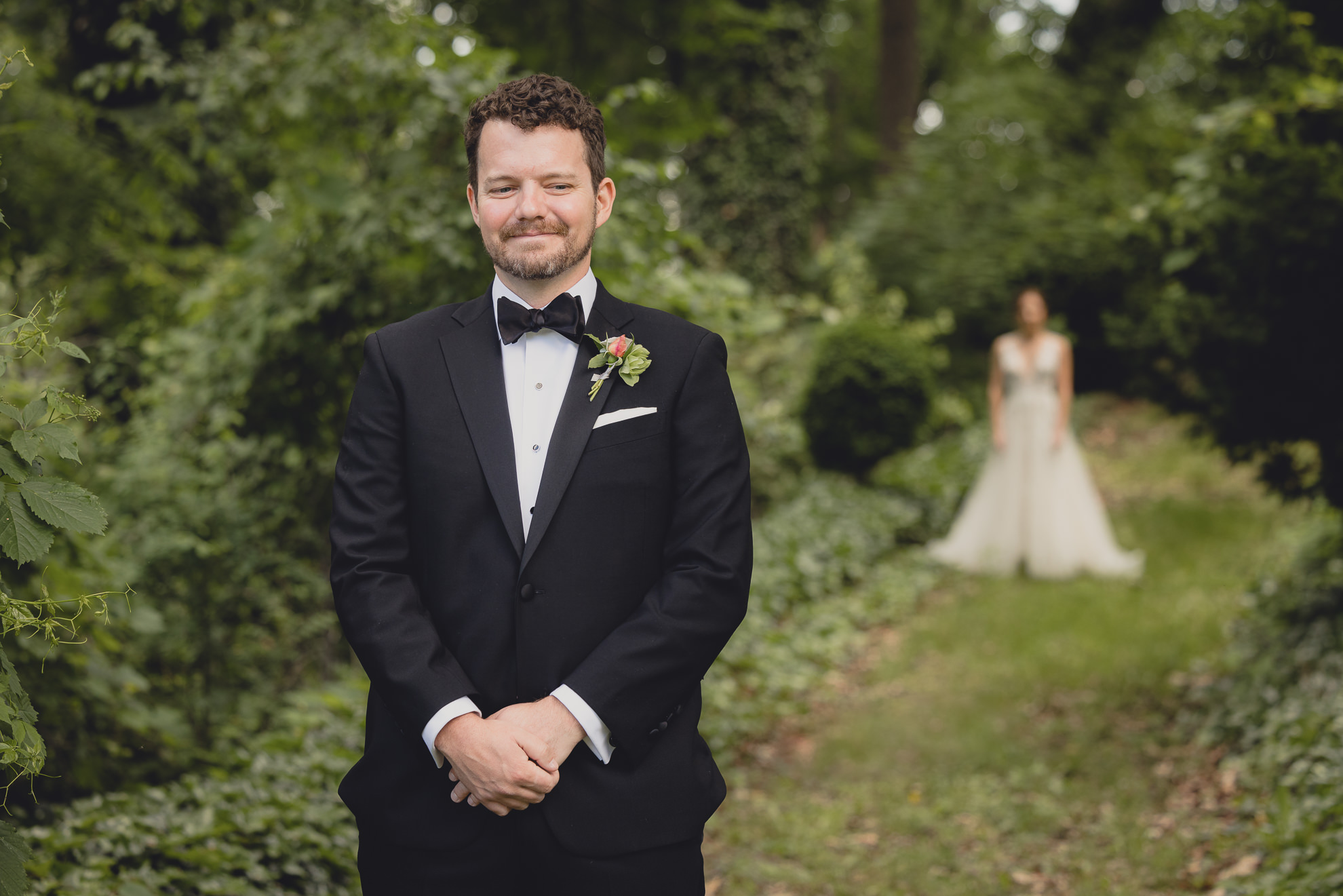 groom waits for bride at Barton Hill House in Lewiston, NY before wedding
