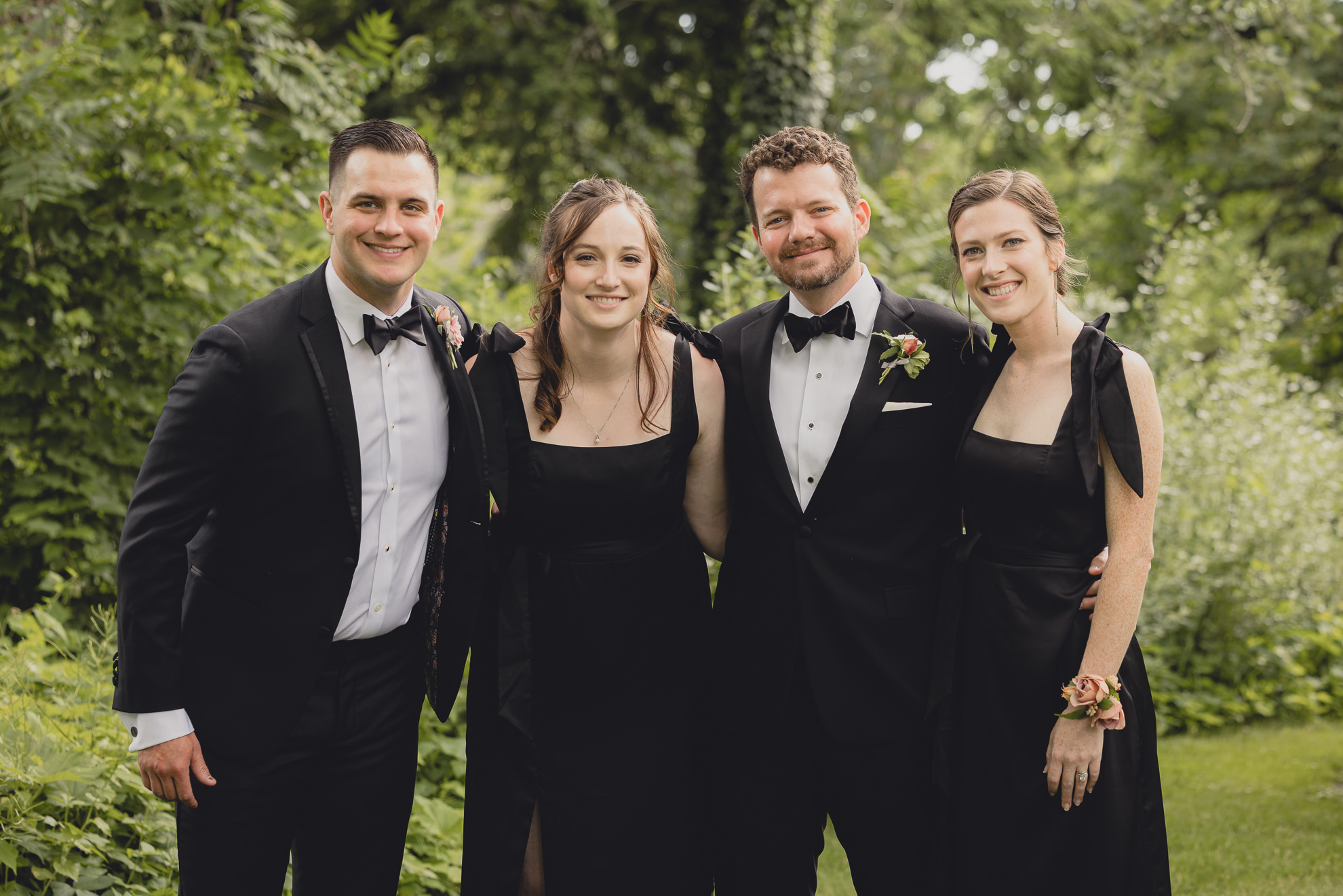wedding party poses for portrait at Barton Hill House in Lewiston, NY before wedding