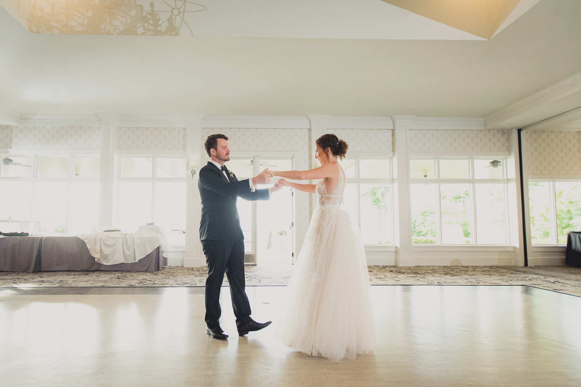bride and groom dance during wedding reception at the Niagara Falls Country Club