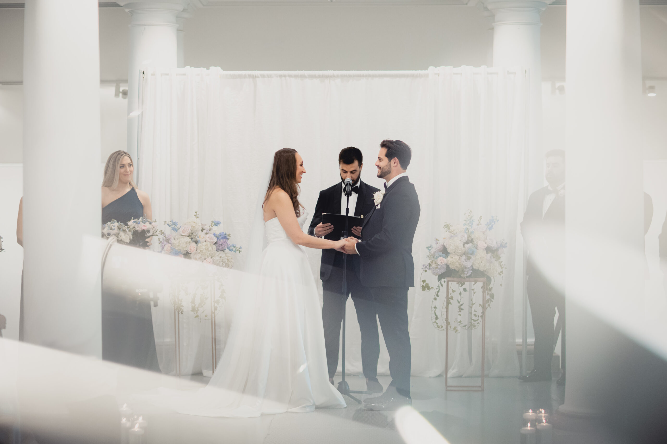 abstracted photo of wedding ceremony in the Portico Gallery of the Buffalo History Museum