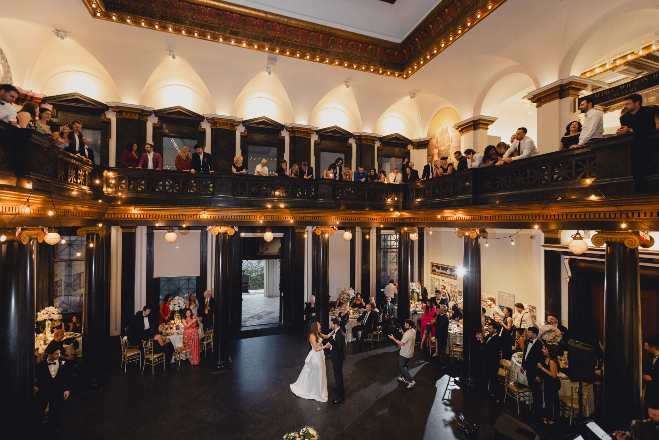bride and groom share first dance during wedding reception at the Buffalo History Museum