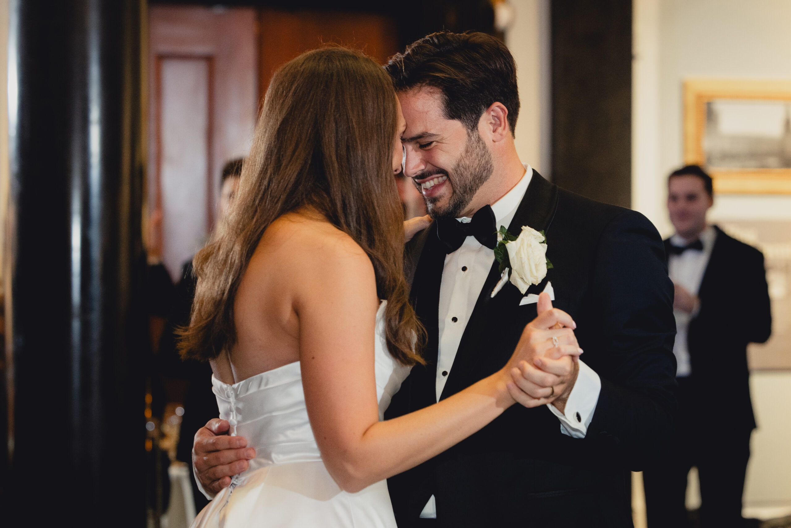 bride and groom share first dance during wedding reception at the Buffalo History Museum