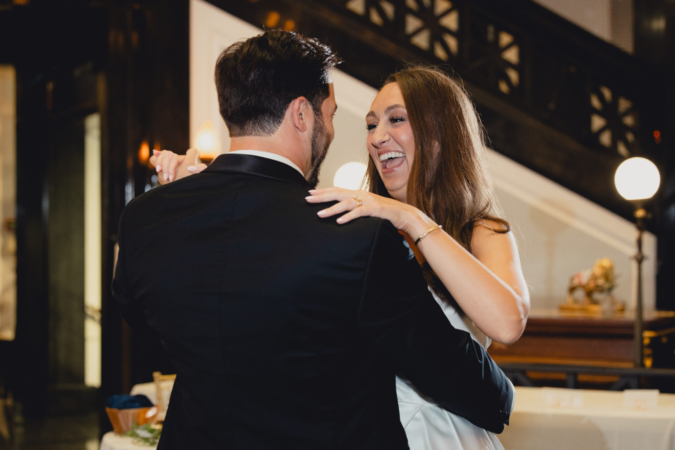 bride and groom share first dance during wedding reception at the Buffalo History Museum