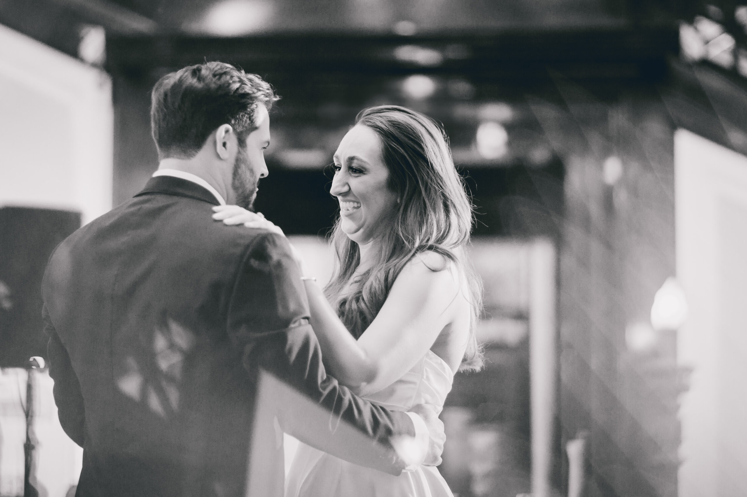 bride and groom share first dance during wedding reception at the Buffalo History Museum