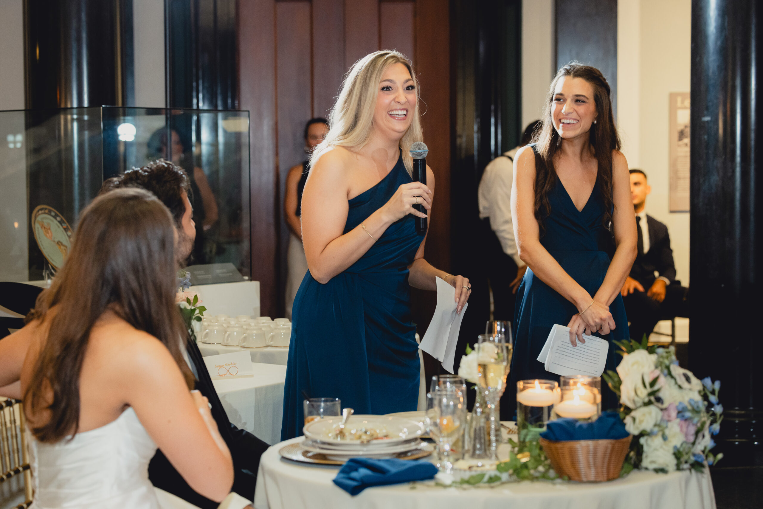 maids of honor deliver speech during wedding reception at the Buffalo History Museum