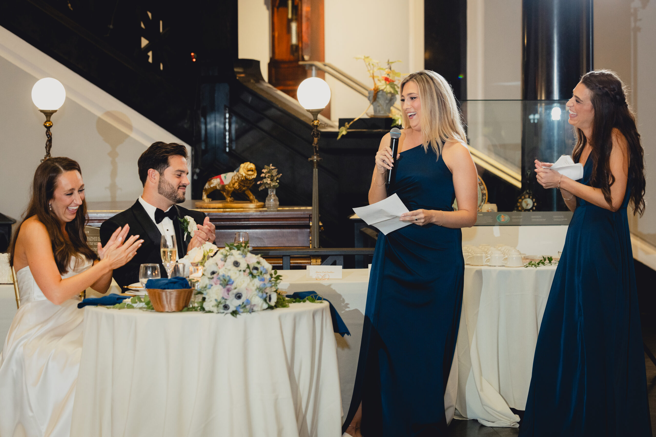maids of honor deliver speech during wedding reception at the Buffalo History Museum
