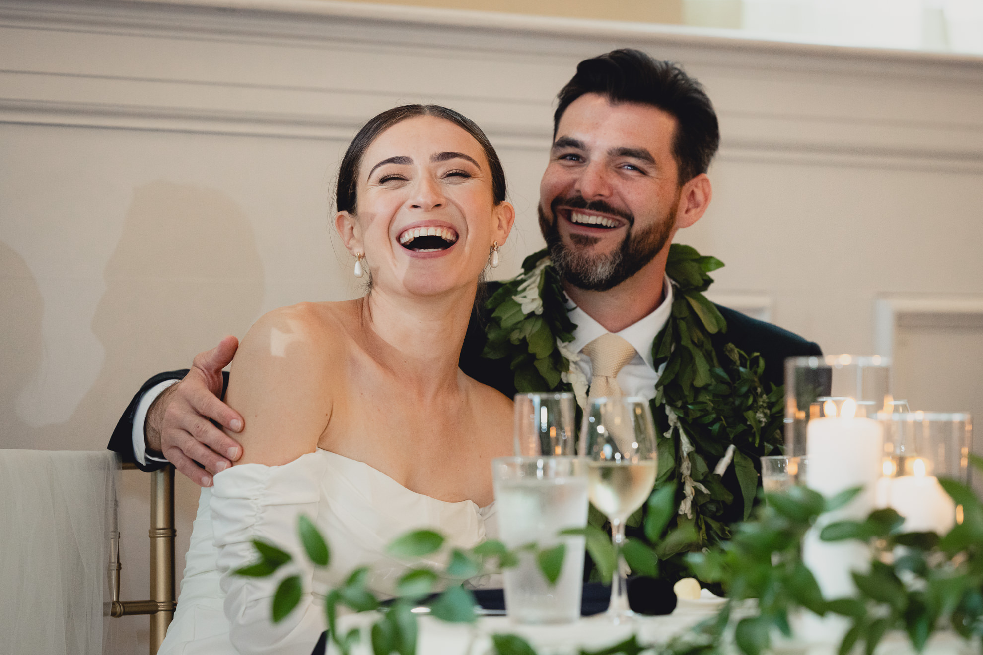 bride and groom react to speech during wedding reception at the Hotel Lafayette in Buffalo, NY