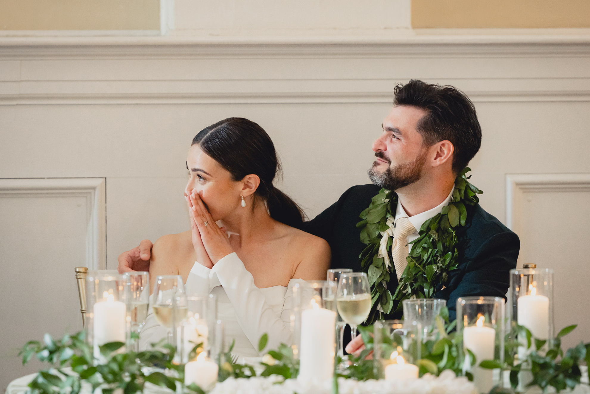 bride and groom react to speech during wedding reception at the Hotel Lafayette in Buffalo, NY