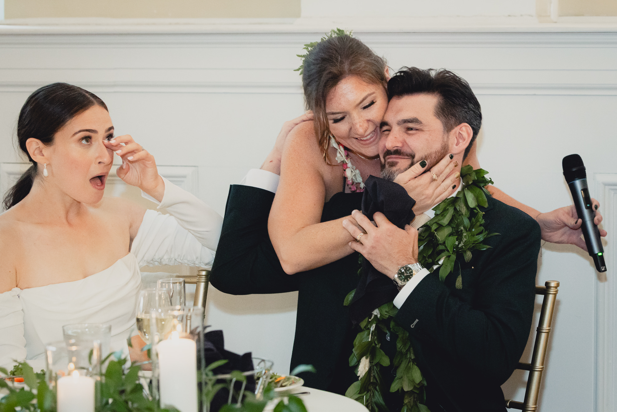 best woman hugs groom after speech during wedding reception at the Hotel Lafayette in Buffalo, NY