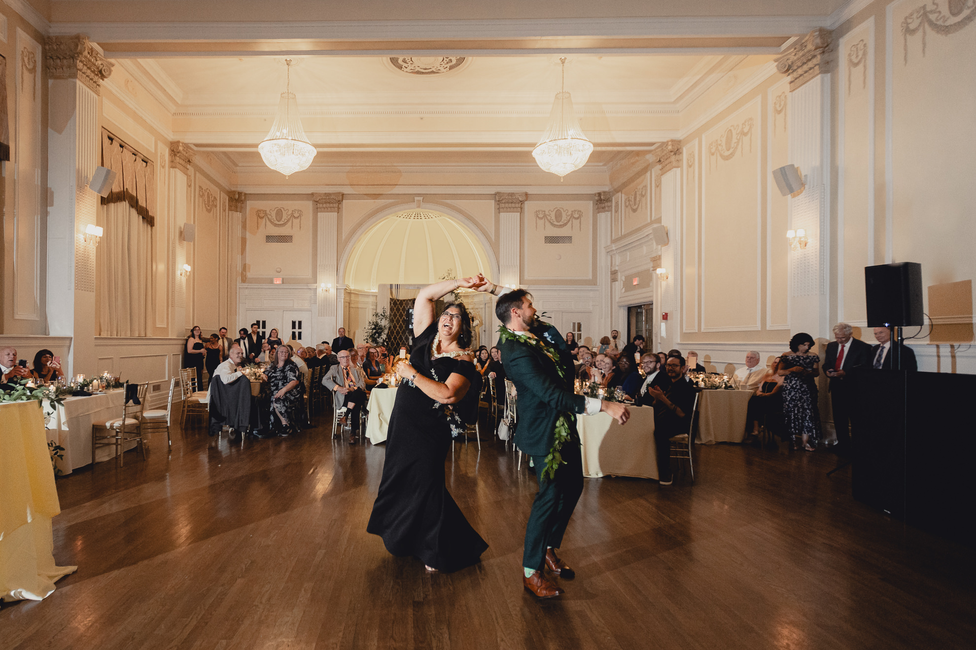 groom and mom spin during mother son dance during wedding reception at the Hotel Lafayette in Buffalo, NY