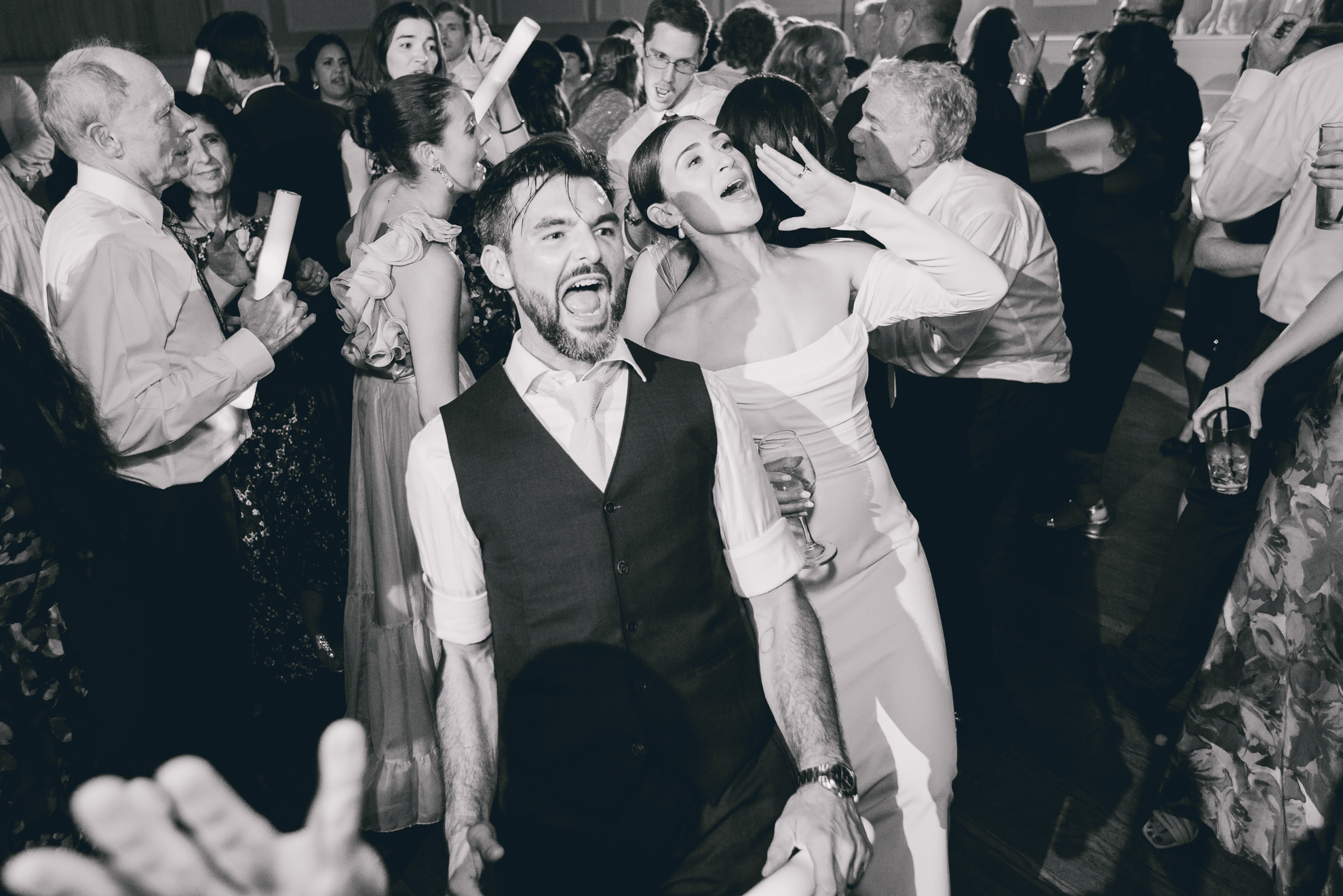 bride and groom sing during wedding reception at the Hotel Lafayette in Buffalo, NY