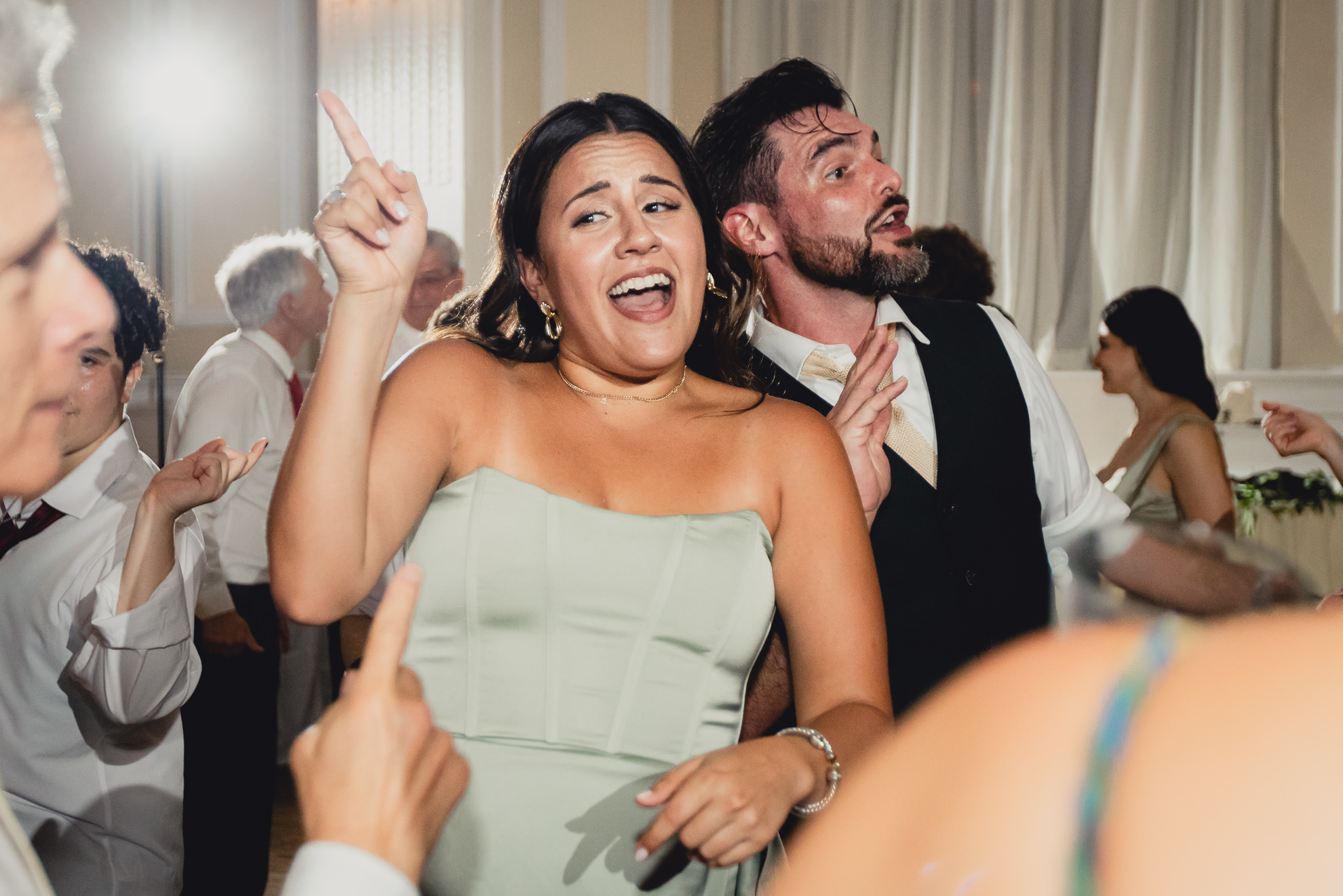 guests sing and dance during wedding reception at the Hotel Lafayette in Buffalo, NY