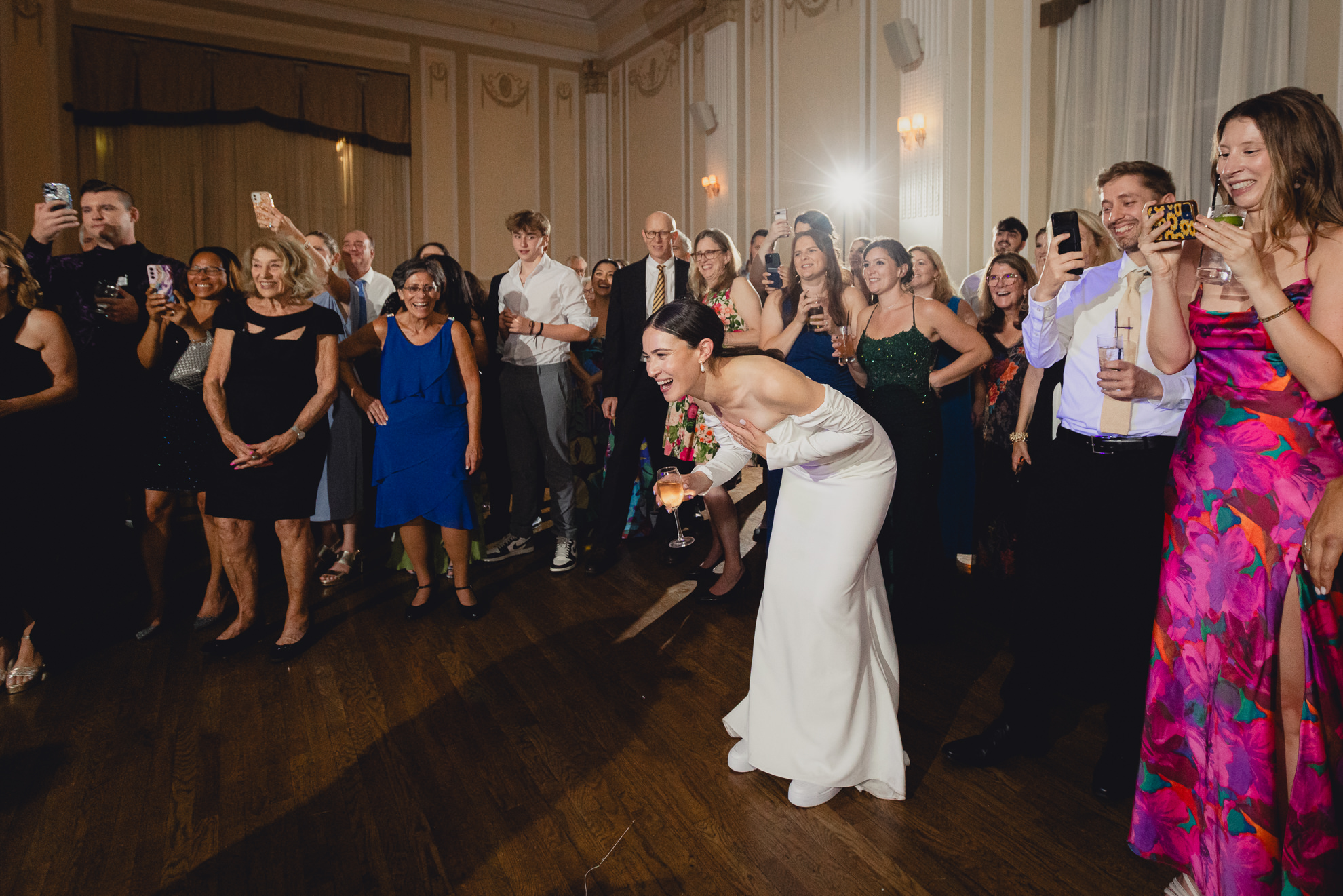 guests react to a capella song during wedding reception at the Hotel Lafayette in Buffalo, NY