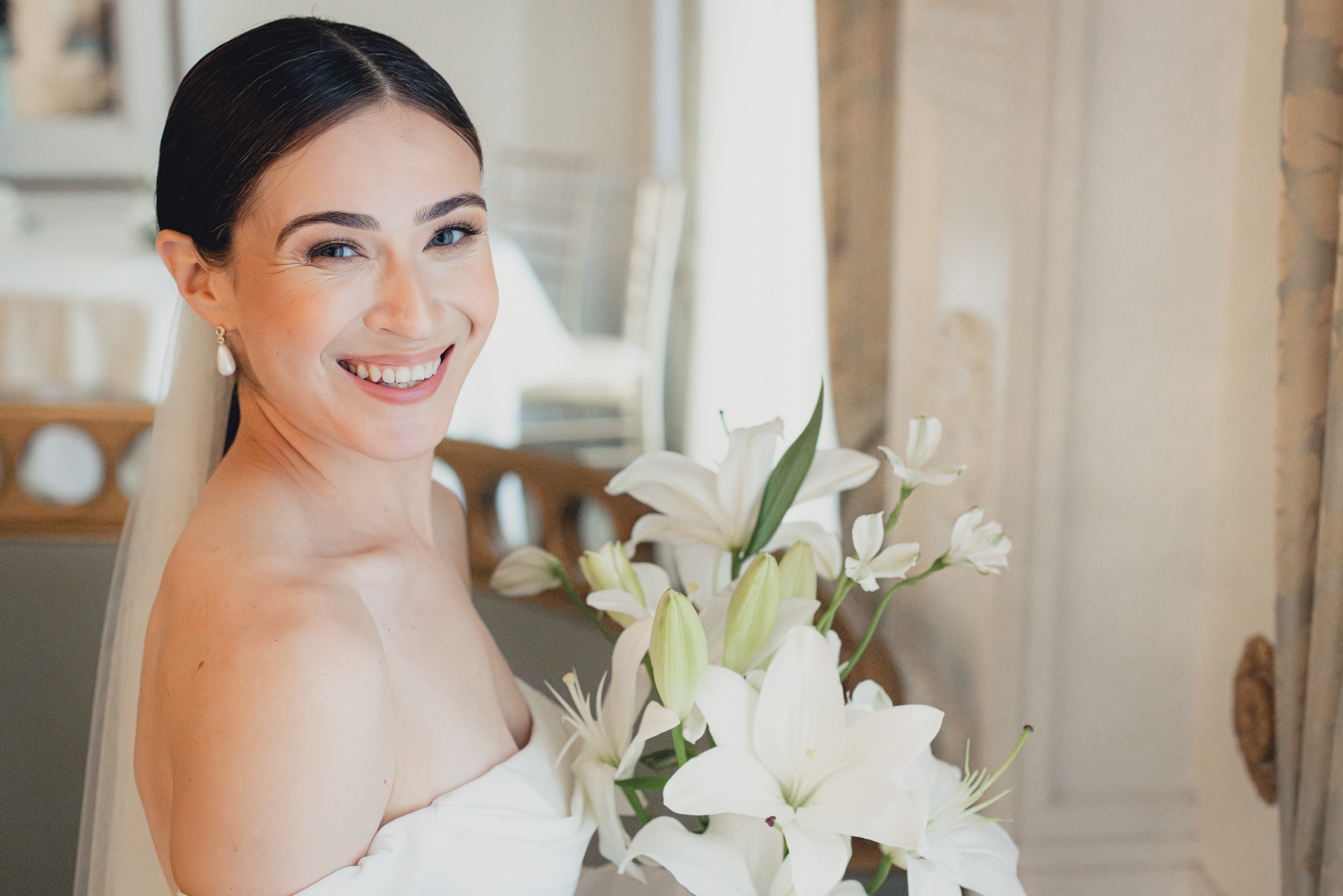 bride poses for portrait in Crystal ballroom in Buffalo, NY