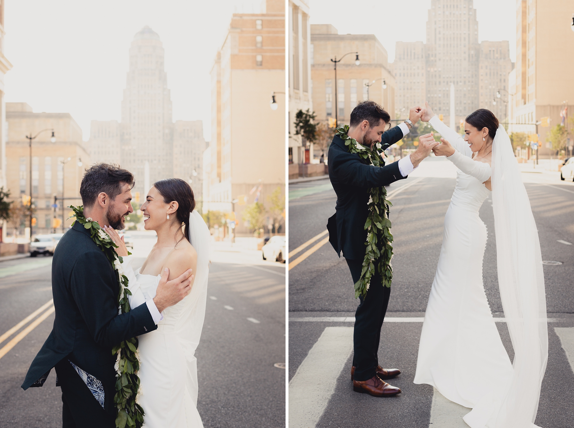 bride and groom embrace and dance during portrait session in downtown Buffalo, NY with City Hall in background after wedding ceremony