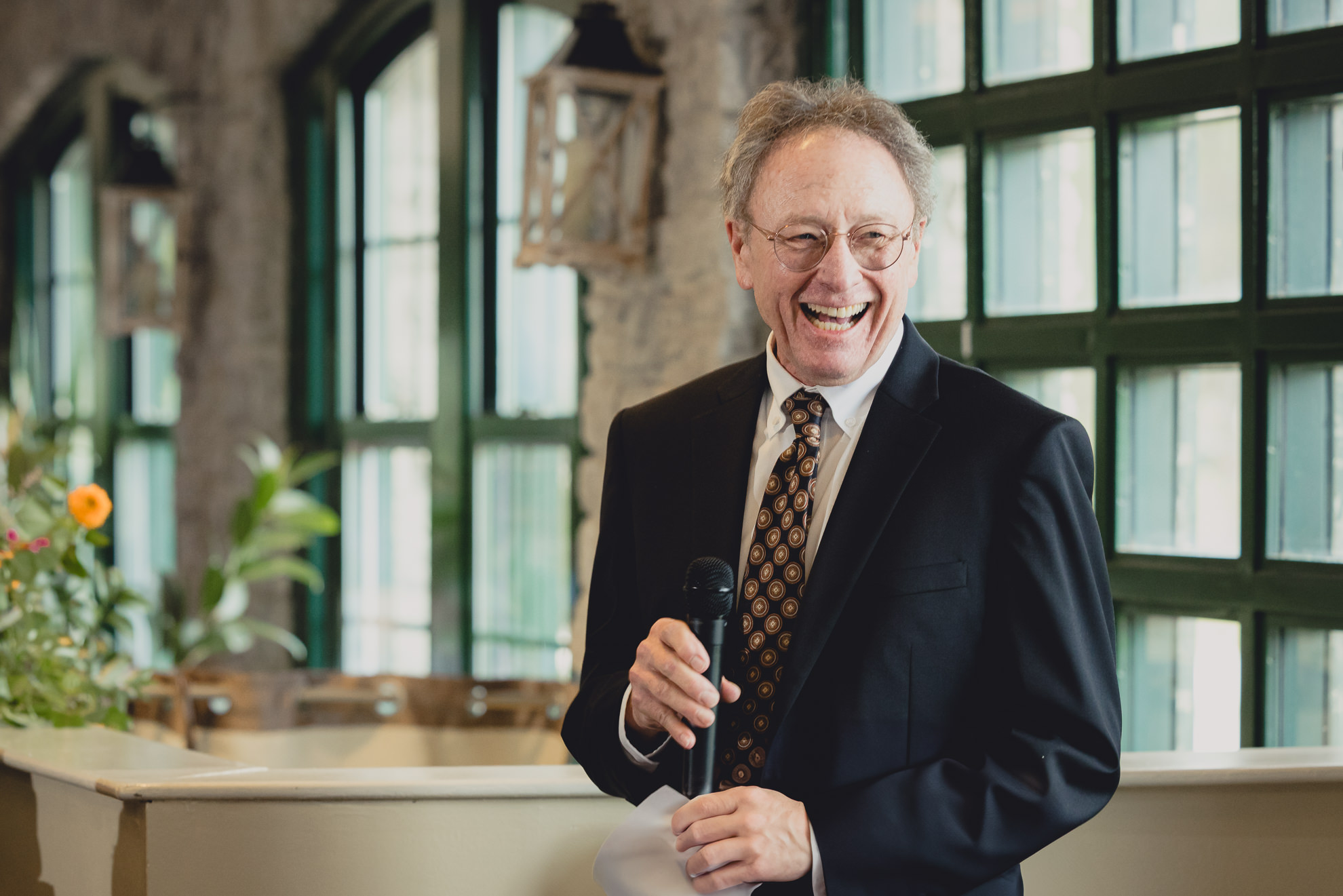 father delivers speach  during wedding reception at the Terrace at Marcy Casino in Buffalo, NY