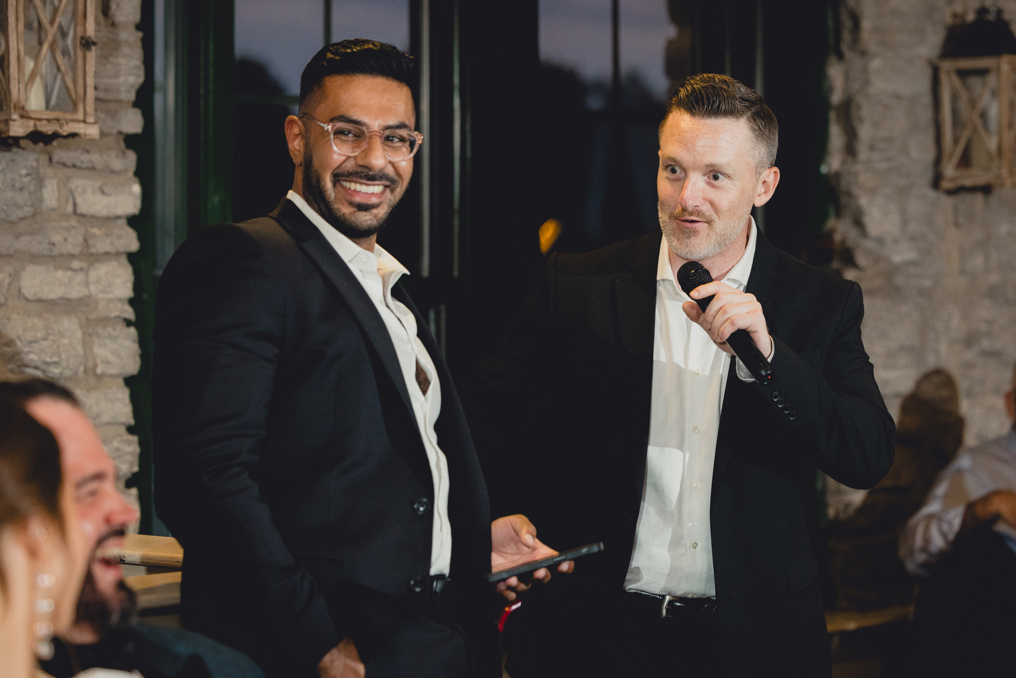 groomsmen deliver speech  during wedding reception at the Terrace at Marcy Casino in Buffalo, NY