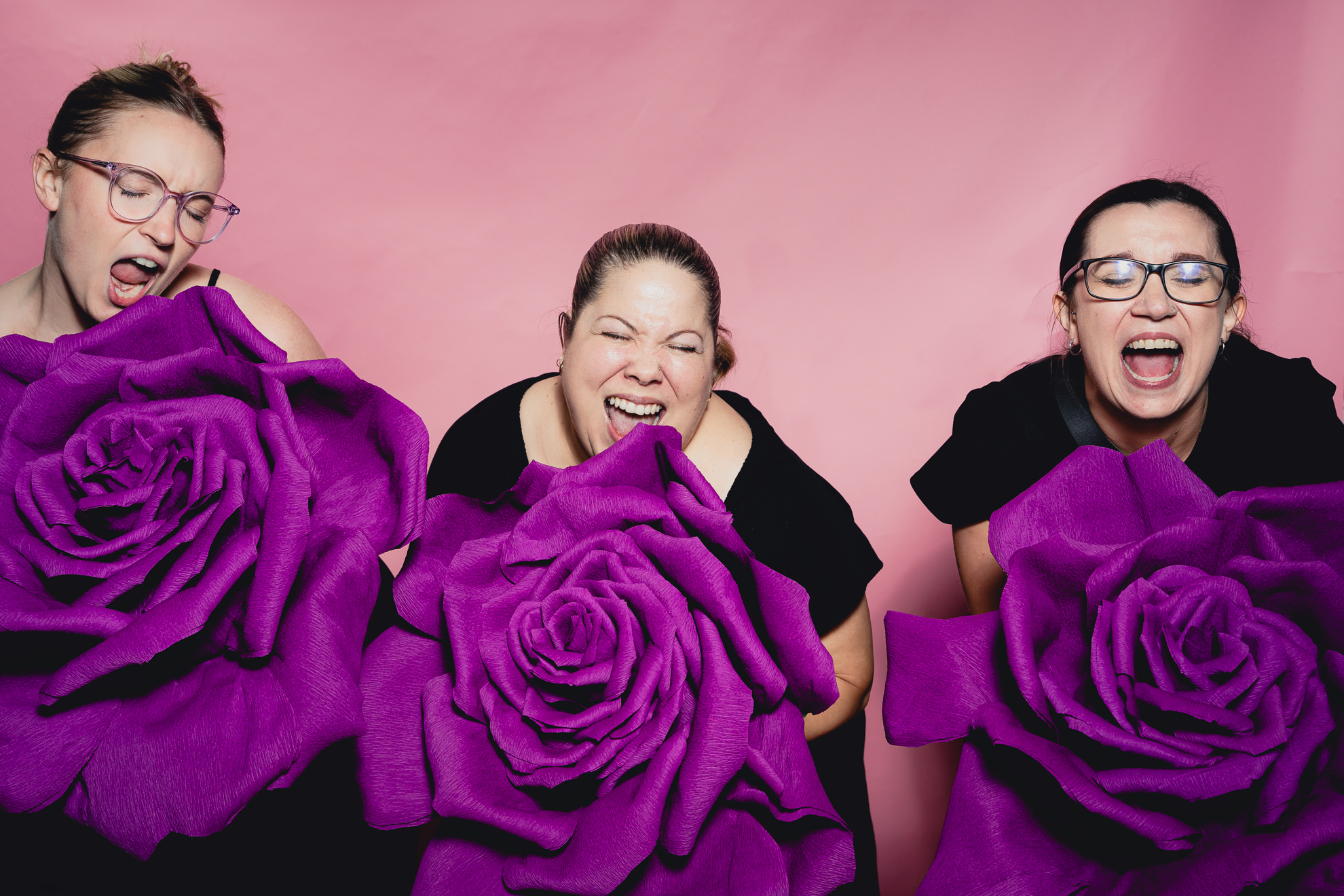 guests pose for photo booth portrait station pictures at wedding at the Terrace at Marcy Casino in Buffalo, NY