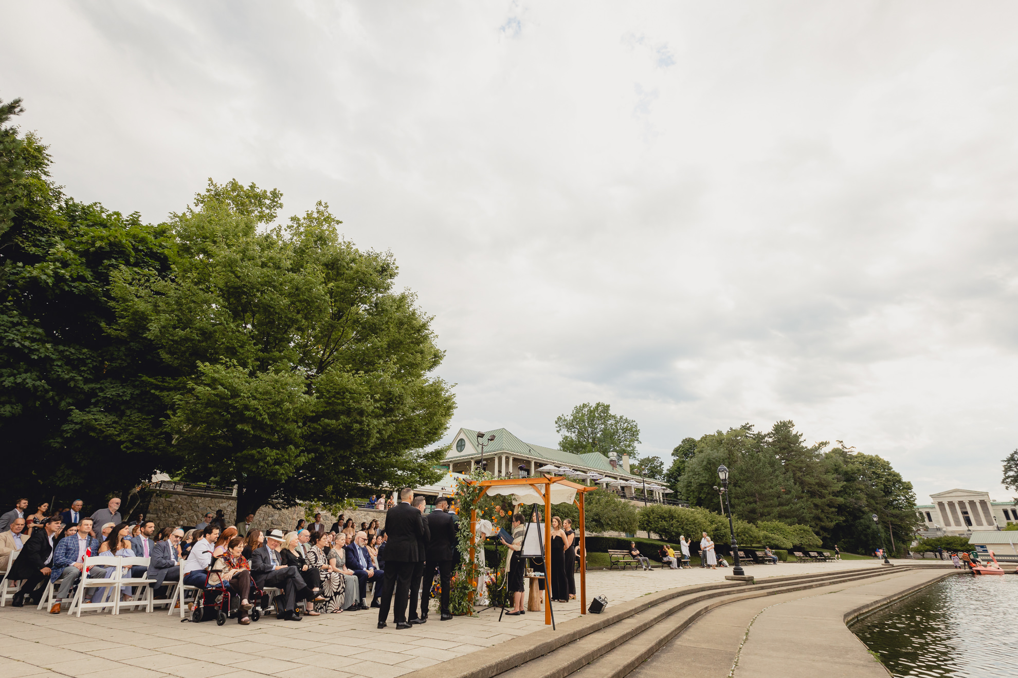 AKG and the Terrace at Marcy Casino are seen behind wedding ceremony at Hoyt Lake