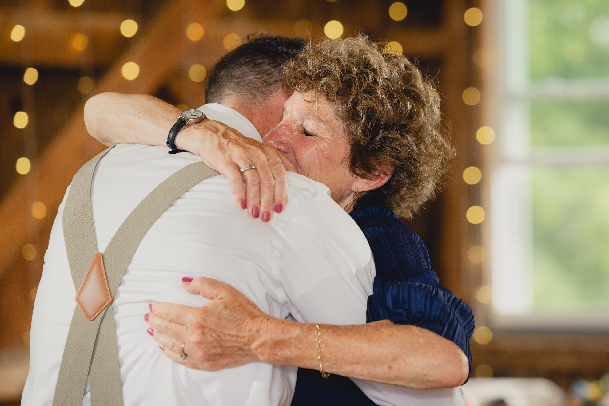 guests dance during wedding reception at The Gallagher Barn in Medina, NY