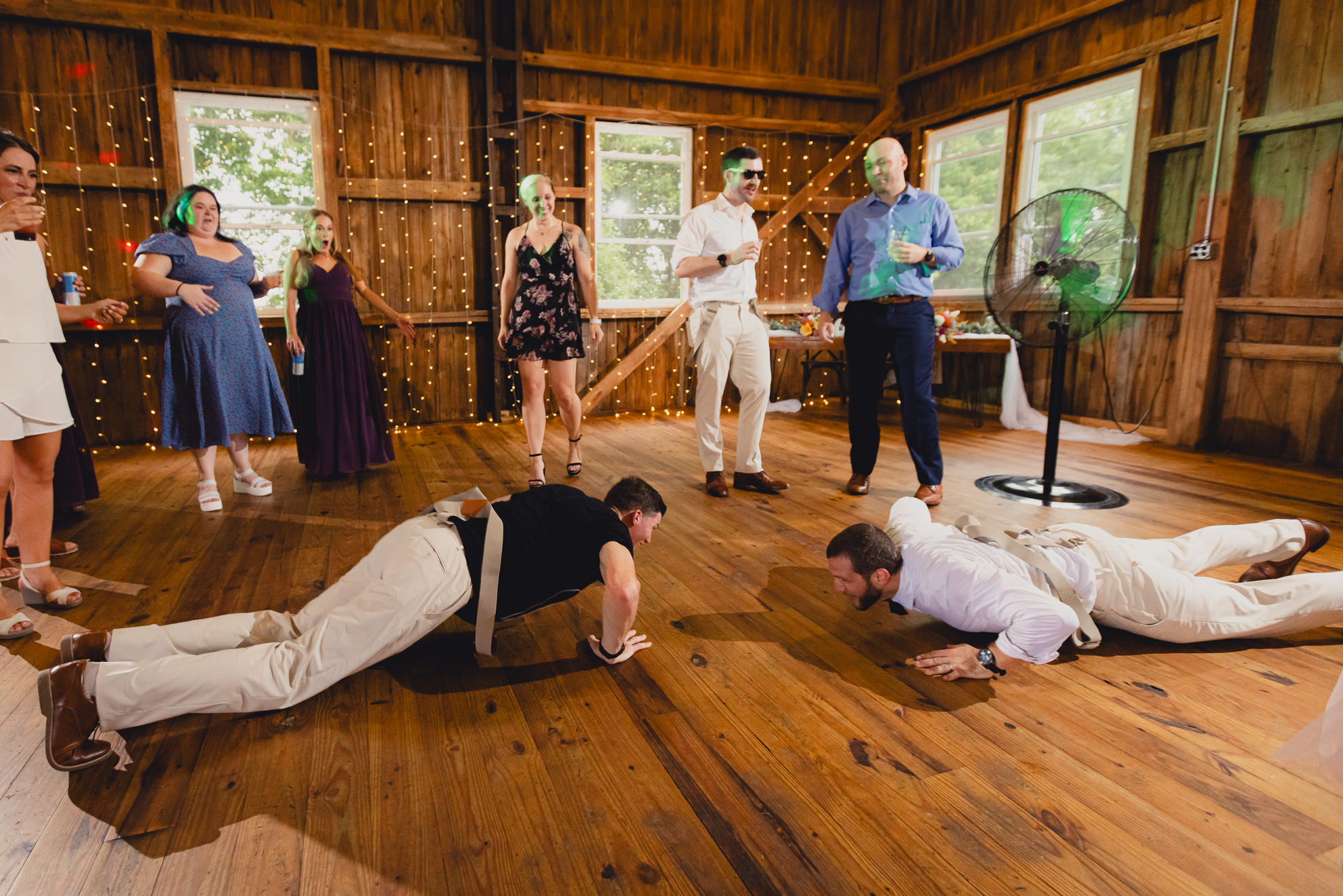 guests dance during wedding reception at The Gallagher Barn in Medina, NY