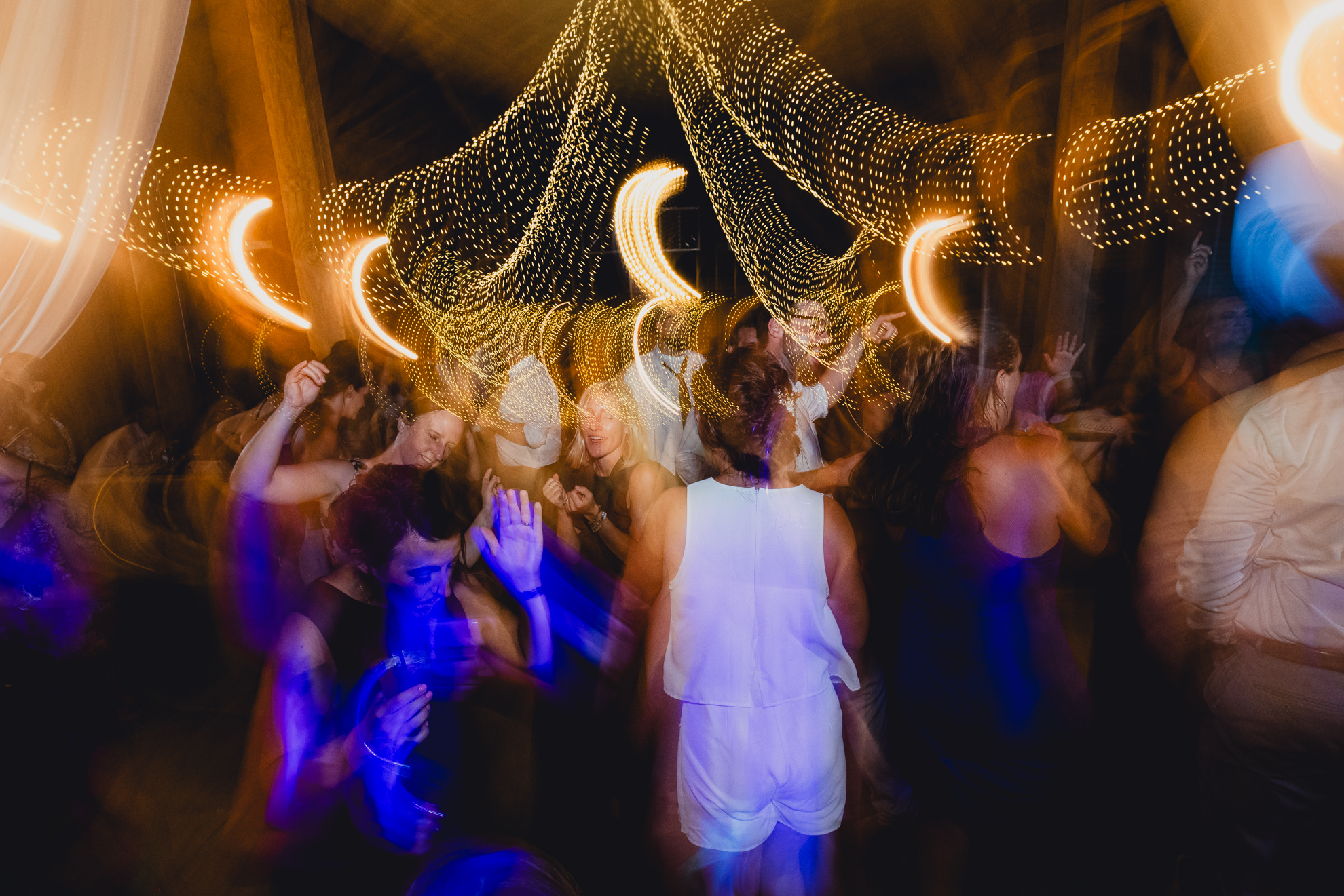 guests dance during wedding reception at The Gallagher Barn in Medina, NY