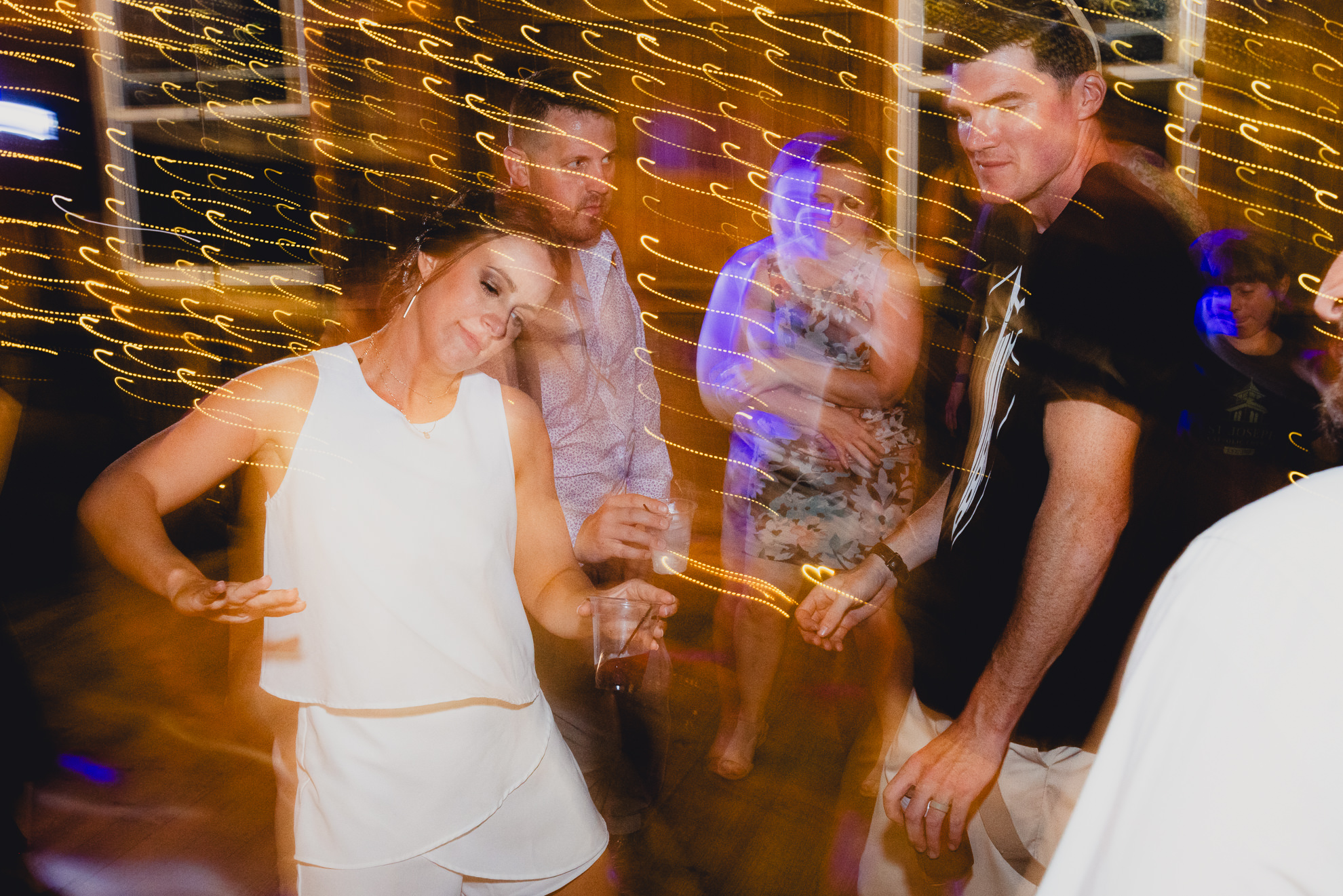 guests dance during wedding reception at The Gallagher Barn in Medina, NY