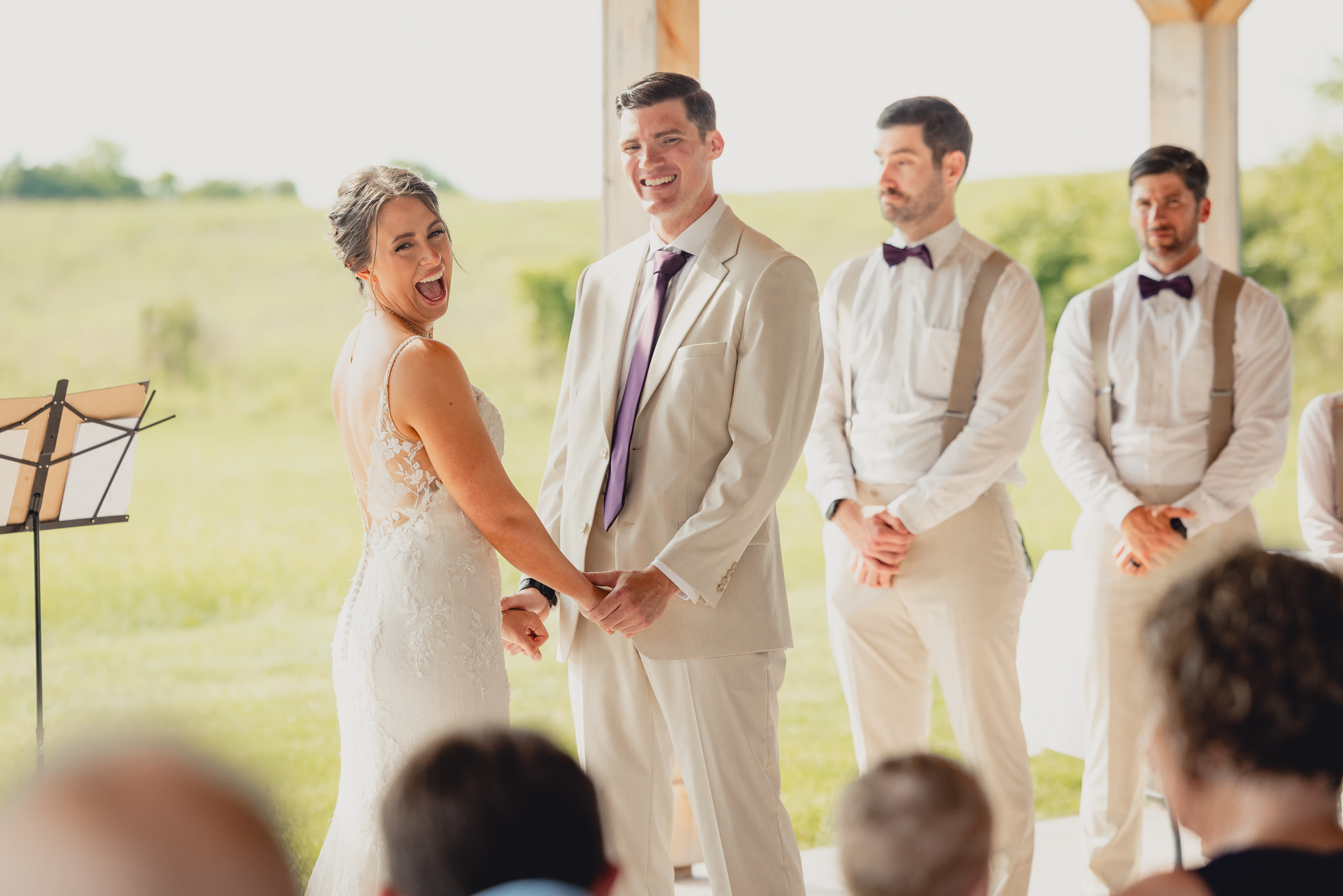 during wedding ceremony at The Gallagher Barn in Medina, NY