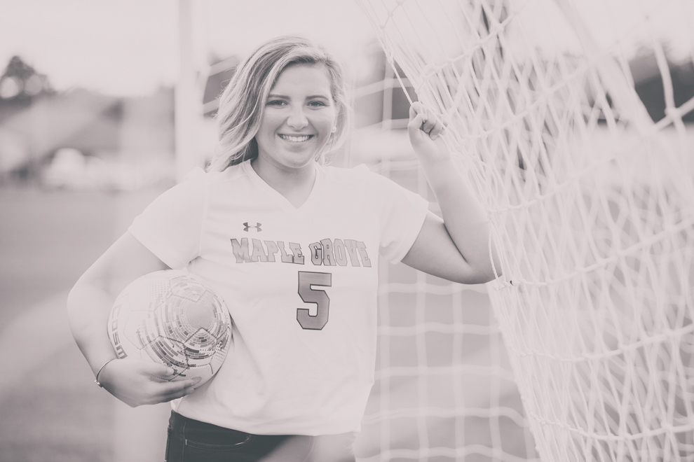 Maple Grove Senior Portrait of Alli at soccer field near Lake Chautauqua in Bemus Point, NY