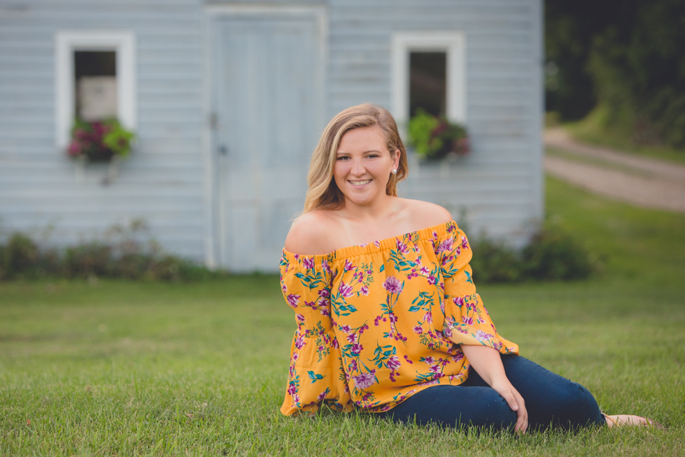Maple Grove Senior Portrait of Alli near cottage by Lake Chautauqua in Bemus Point, NY
