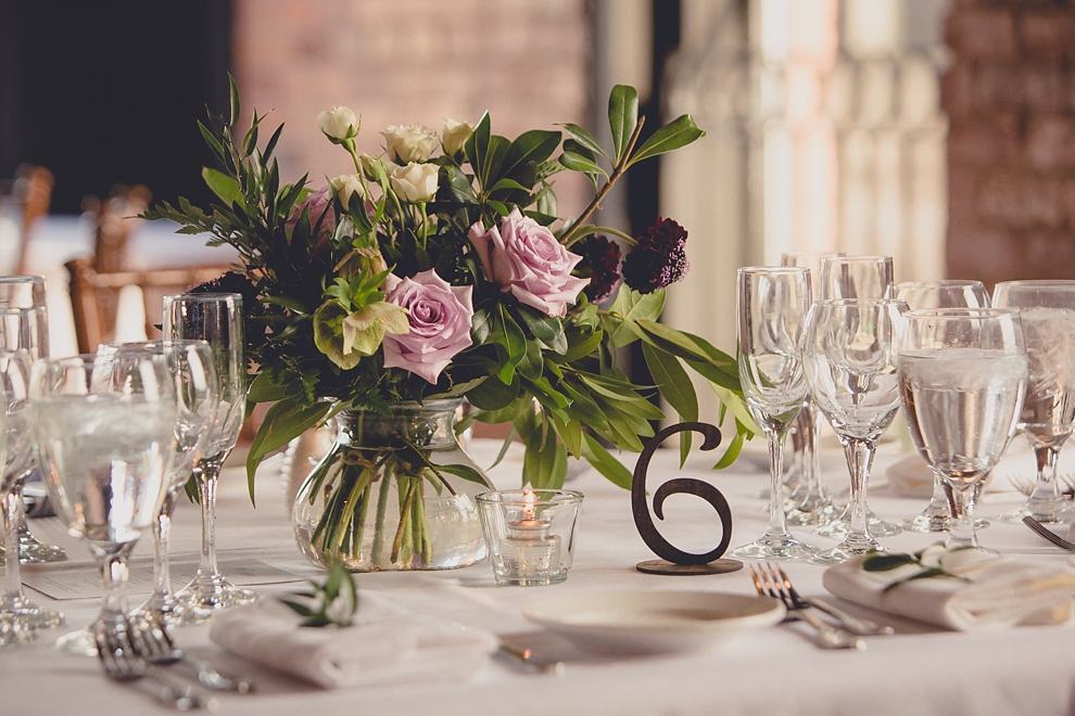 whimsical spring wedding details from Quaint Rentals and William's Florist at pearl st grill and brewery in Buffalo, NY