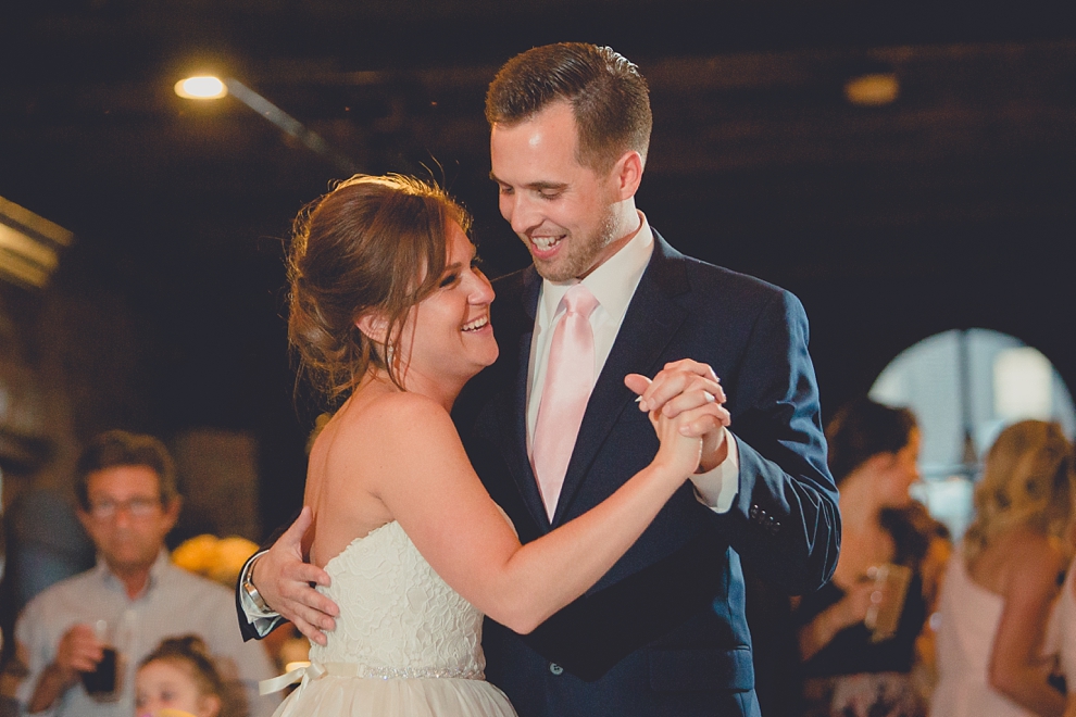 bride and groom dance at wedding at Pearl Street Grill and Brewery in Buffalo, NY
