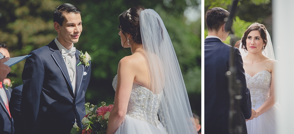 bride and groom look at each other during garden wedding ceremony at Samuel's Grande Manor near Buffalo, NY