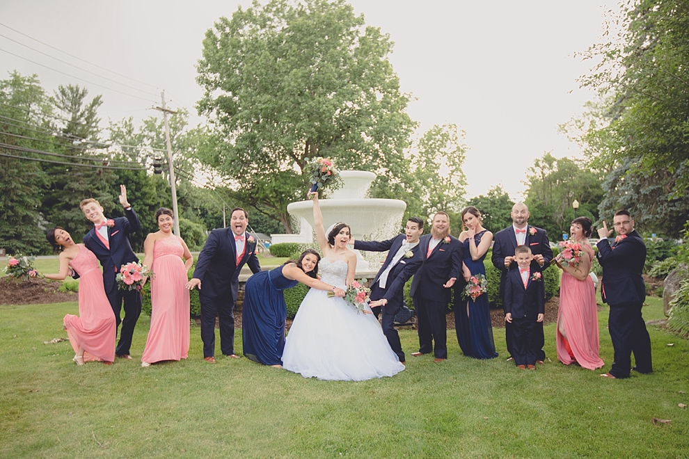 bridal party poses for portraits after garden wedding ceremony at Samuel's Grande Manor near Buffalo, NY