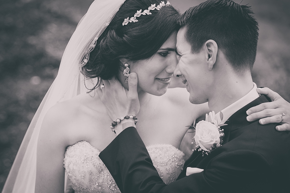 bride and groom pose for portraits after garden wedding ceremony at Samuel's Grande Manor near Buffalo, NY