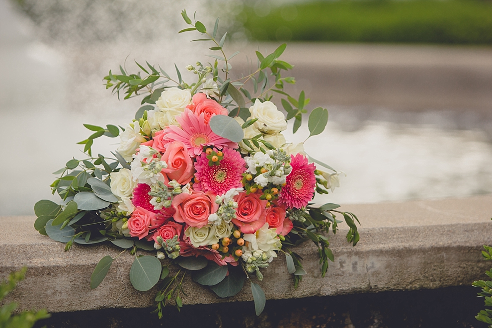 brides flowers near fountain after garden wedding ceremony at Samuel's Grande Manor near Buffalo, NY